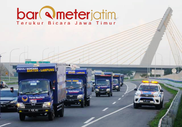 Armada 38 truk Partai Nasdem melintasi tol Trans Jawa karya pemerintahan Jokowi. | Foto: Barometerjatim.com/natha lintang