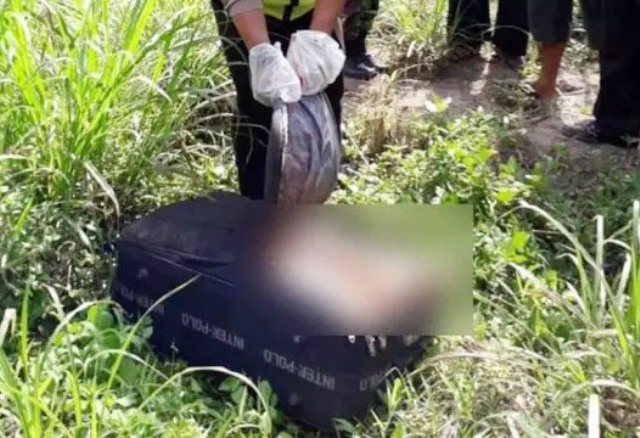 Mayat dalam koper korban mutilasi, potongan kepala hingga kini belum juga ditemukan. | Foto: Ist