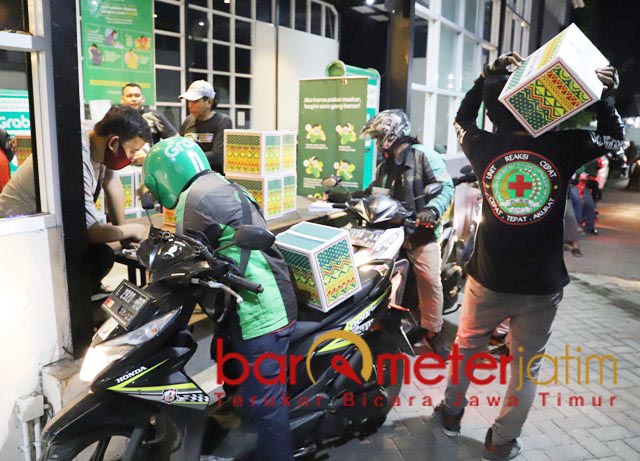 UNTUK TERDAMPAK: PT AMJ manfaatkan Ojol untuk distibusikan Bansos pemerintah. | Foto: Barometerjatim.com/ROY HS