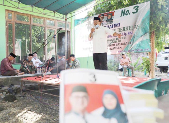 PAKET NU: Haji Masnuh, hanya Kelana Aprilianto-Dwi Astutik calon yang paket NU asli. | Foto: Barometerjatim.com/ROY HS